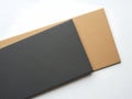Stack of cardboard sheets in gray and beige Royalty Free Stock Photo