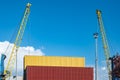 Stack of Cargo Containers at the dock. Container cargo ship with crane loading cargo Royalty Free Stock Photo