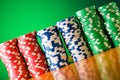 Stack of casino chips against gradient Royalty Free Stock Photo