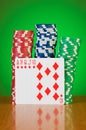 Stack of casino chips against gradient Royalty Free Stock Photo
