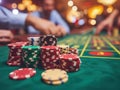 Stack of casino chips or poker chips on gambling table in ground casino. Royalty Free Stock Photo