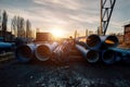 Stack of cast iron pipes in loading area waiting for transportation Royalty Free Stock Photo
