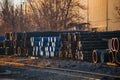 Stack of cast iron pipes in loading area waiting for transportation Royalty Free Stock Photo
