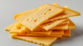 Stack of Cheddar cheese slices in a bright, clean setting Royalty Free Stock Photo