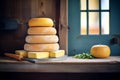 a stack of cheese wheels in a cellar Royalty Free Stock Photo