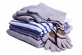 Stack of children`s sweatshirts, a scarf and gloves