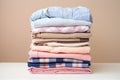 stack of childrens clothing, carefully folded