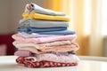 stack of childrens clothing, carefully folded