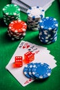 Stack of chips and cards on a table - poker game concept Royalty Free Stock Photo