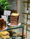 Stack of Chocolate Brownie Pieces at Cafe Shop