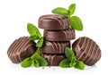 Stack of chocolate candies with fresh mint leaves Royalty Free Stock Photo