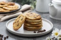 Stack of chocolate chip cookies. Dark background. Sweet delicious snack Royalty Free Stock Photo