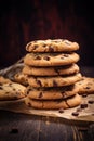 Stack of chocolate chip cookies on the table, close up view. Homemade pastries. AI generated
