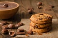 Stack of chocolate cookies with ingredients