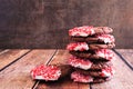 Stack of Christmas chocolate candy cane cookies with a dark background