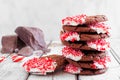 Stack of Christmas chocolate candy cane cookies with a white wood background Royalty Free Stock Photo