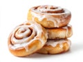 A stack of cinnamon rolls with icing on a white background Royalty Free Stock Photo