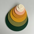 Stack of circular textured felt pieces arranged in descending size order Royalty Free Stock Photo