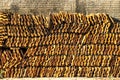 Stack of clay tile It arranged vertically with wall background