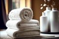 stack clean bath towels made of snow-white fluffy fabric on table