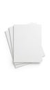 Stack of clean, blank white paper sheets isolated on white background Royalty Free Stock Photo