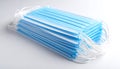 Stack of clean blue disposable face masks ready for protection and health awareness Royalty Free Stock Photo