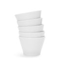 Stack of clean bowls on white background