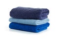 Stack of clean coloful soft towels on white background