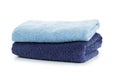 Stack of clean coloful soft towels on white background