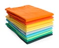 Stack of clean colorful t-shirts isolated on white Royalty Free Stock Photo