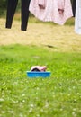 Stack of clean laundry in plastic cup outdoors Royalty Free Stock Photo