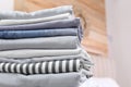 Stack of clean linens in bedroom, closeup Royalty Free Stock Photo