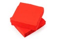 stack of clean red paper napkins on a white background. Royalty Free Stock Photo
