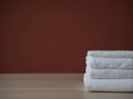 Clean towels folded on table Royalty Free Stock Photo