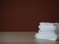 Clean towels folded on table Royalty Free Stock Photo
