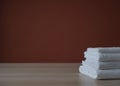 Clean towels folded on table Royalty Free Stock Photo