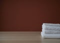 Clean towels folded on table Royalty Free Stock Photo