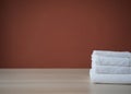 Clean towels folded on table Royalty Free Stock Photo