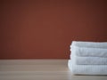 Clean towels folded on table Royalty Free Stock Photo