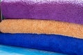 Stack of clean towels of different colors