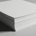 Stack of clean white paper sheets neatly aligned on a flat surface Royalty Free Stock Photo