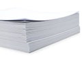 Stack of clean, white printer paper on white surface Royalty Free Stock Photo