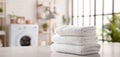 The stack of clean white towels in a bright modern laundry room. AI generated image Royalty Free Stock Photo