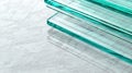 A stack of clear glass pieces with a teal stripe. Royalty Free Stock Photo
