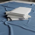 A stack of closed, blank white hardcover books is placed on a Royalty Free Stock Photo