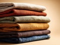 A stack of clothes in different colors. Generative AI. Royalty Free Stock Photo