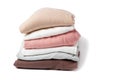 A stack of clothes isolated on white background close-up. Royalty Free Stock Photo