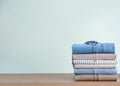 Stack of clothes on table Royalty Free Stock Photo
