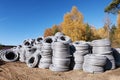 Stack of coiled plastic pvc Polyethylene Corrugated drainage pipes for sewer system outdoor warehouse Royalty Free Stock Photo