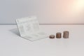 Stack of coins and account book bank on the table Royalty Free Stock Photo